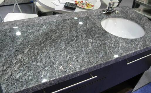 how much does a slab of blue pearl granite countertop cost wholesale?