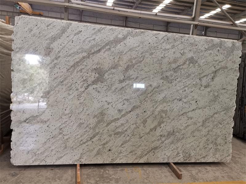 Lennon Granite With White Cabinets Slab