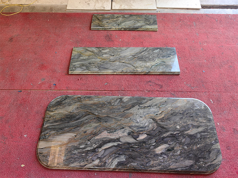 Ocean Fantasy Quartzite is a captivating natural stone known for its dramatic and dynamic appearance. It features a blend of deep blues, vibrant greens, and striking whites, creating a mesmerizing, ocean-like effect. The stone often displays intricate veining and swirling patterns that mimic the movement of waves and currents.