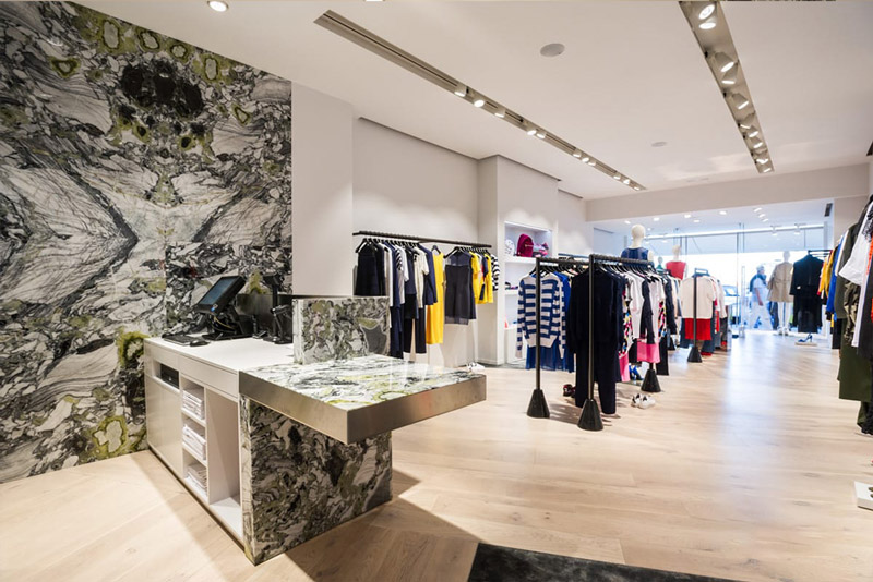 Sandro Boutique Project with Italy Ivory White Travertine Facade & Display Shelving