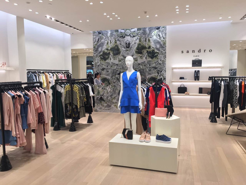 Sandro Boutique Project with Italy Ivory White Travertine Facade & Display Shelving