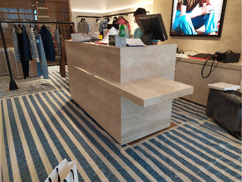 Sandro Boutique Project with Italy Ivory White Travertine Facade & Display Shelving