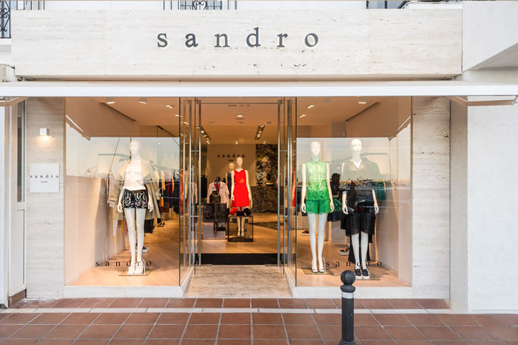 Sandro Boutique Project with Italy Ivory White Travertine Facade & Display Shelving