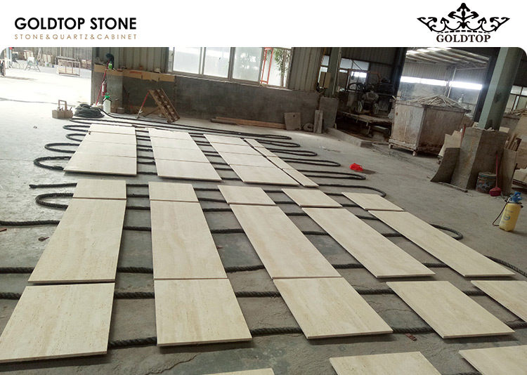 Sandro Boutique Project with Italy Ivory White Travertine Facade & Display Shelving