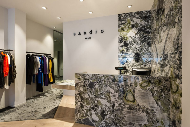 Sandro Boutique Project with Italy Ivory White Travertine Facade & Display Shelving