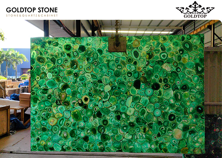LOEWE Store Design with Backlit Green Agate Stone