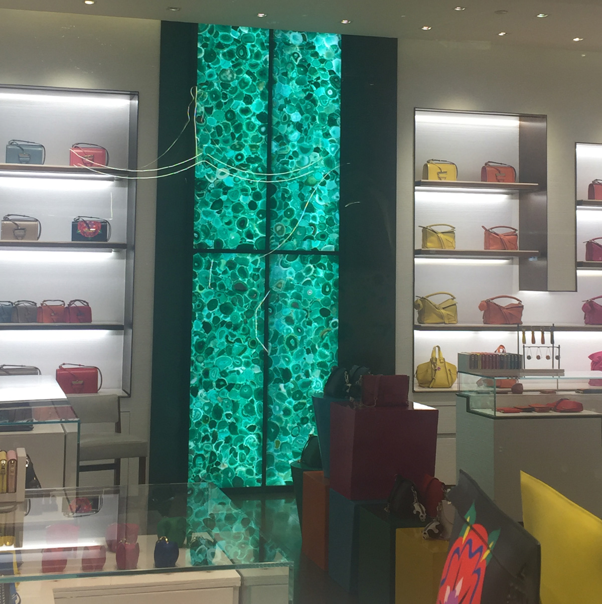 LOEWE Store Design with Backlit Green Agate Stone